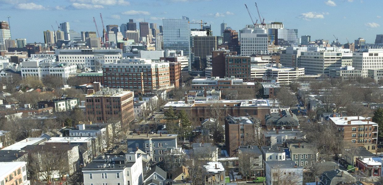 Kendall Square rises among the diverse neighborhoods it borders. Photo by Greig Cranna.