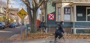 A red X appears on vacant buildings throughout Cambridge. Many are undergoing renovation like this one in the Coast neighborhood. Photo by Lou Jones.