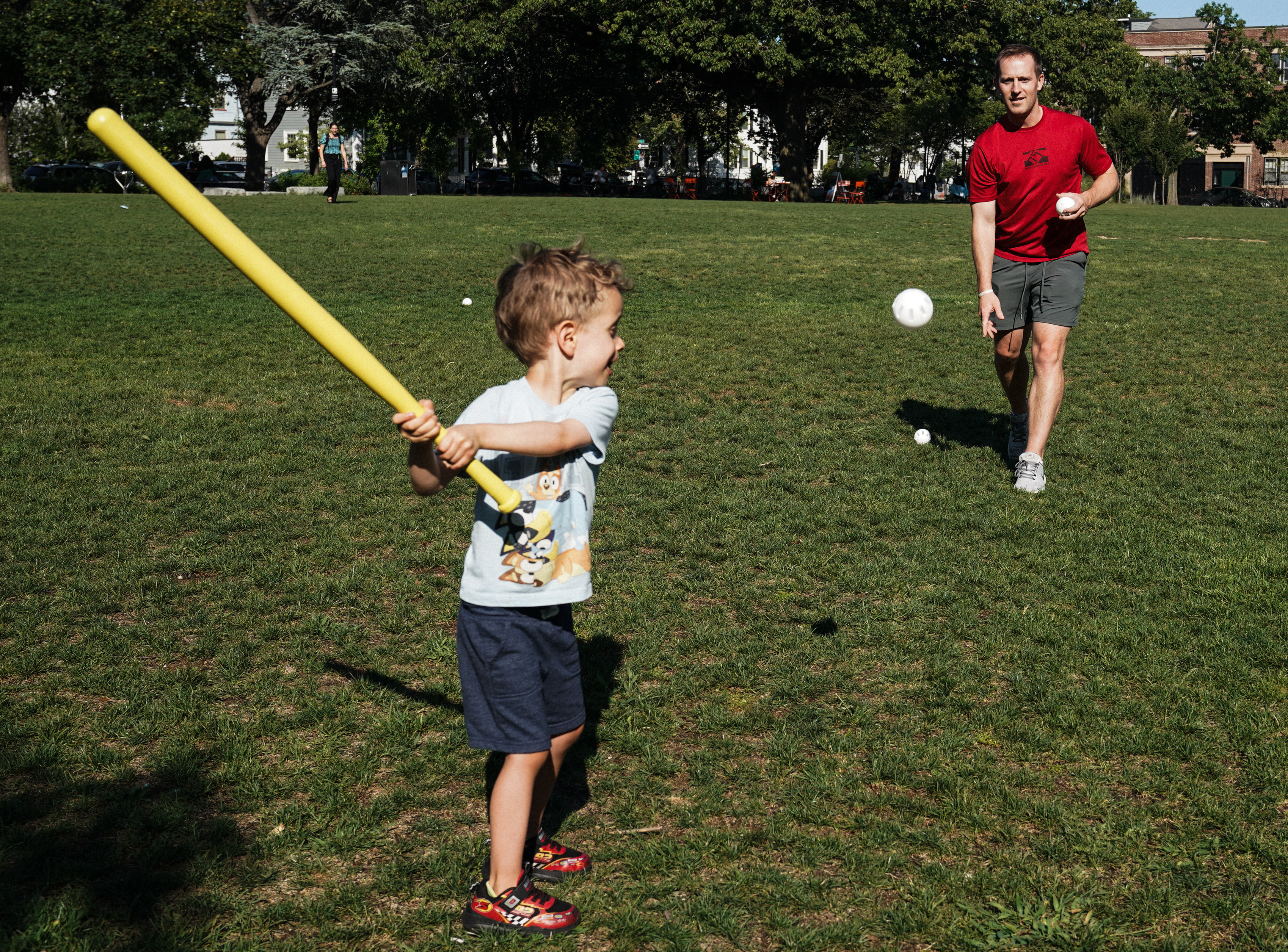 Joe Bradlee throws ball to 4-year old Ryan Patton by Anoke Deitg-Blanchard